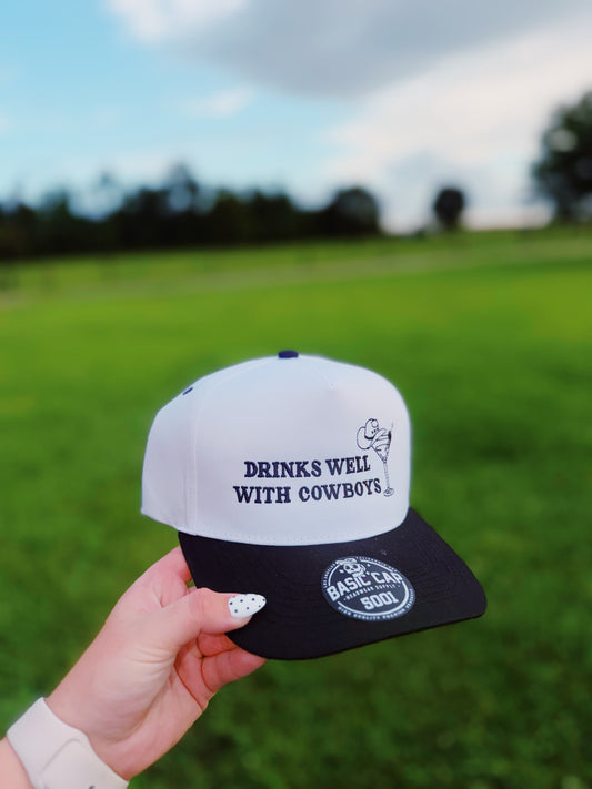 Drinks Well With Cowboys Trucker hat